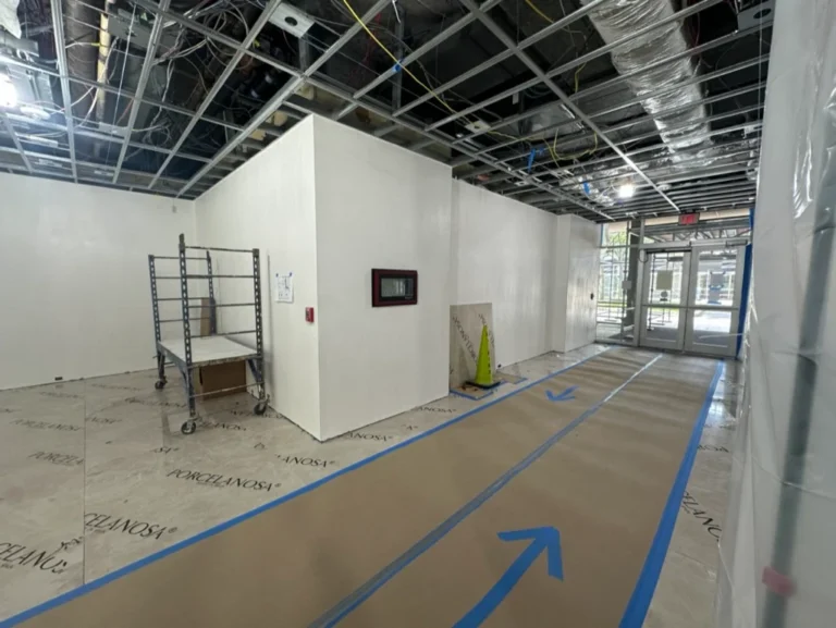 Drywall grid ceiling framing underway at Brook House Condominiums