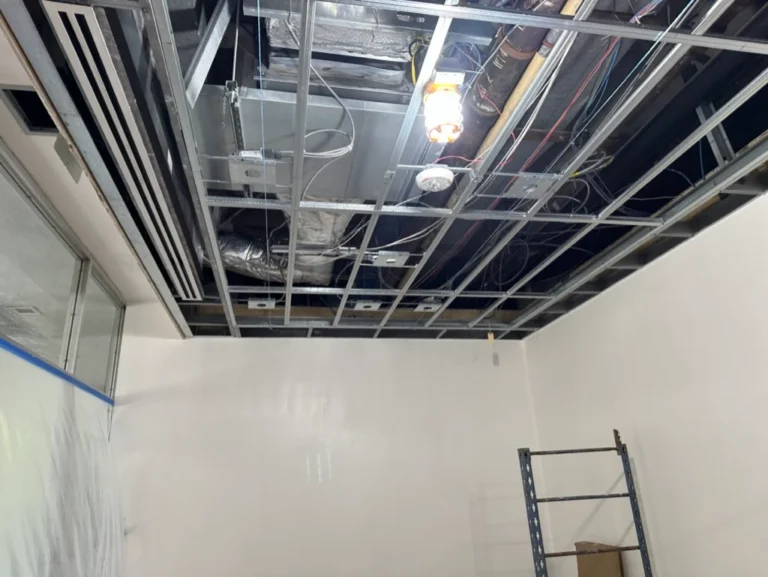 Detail of new drywall grid ceiling system at Brook House Condominiums