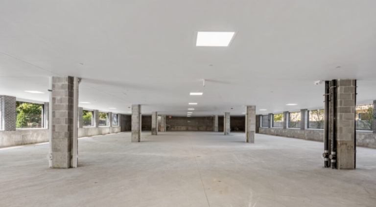 Completed garage with finished drywall at 21 Totman Street, Quincy. Photo credit: Blu Lemonade