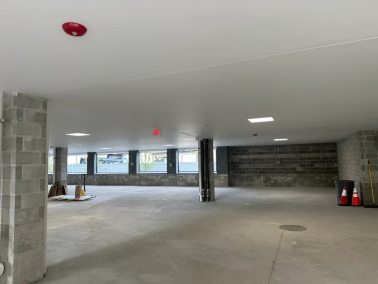 Detail of moisture-resistant drywall ceiling installation at 21 Totman Street, Quincy